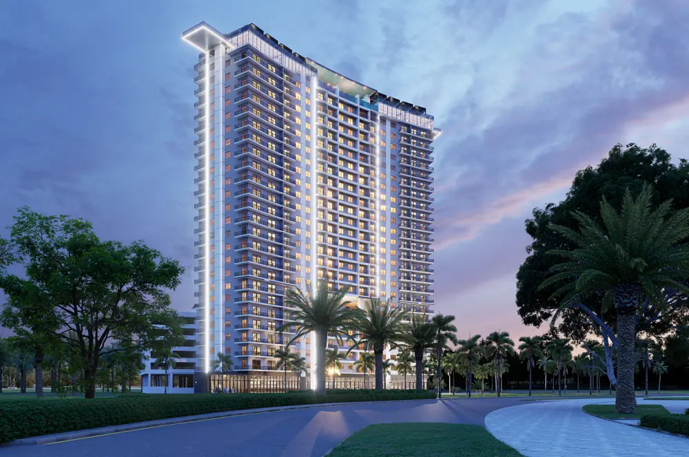Marbella Tower at dusk with illuminated crown and corner light columns