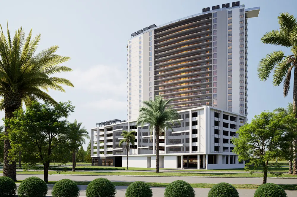Daytime side view of Marbella Tower showing the parking podium and ground-floor lobby