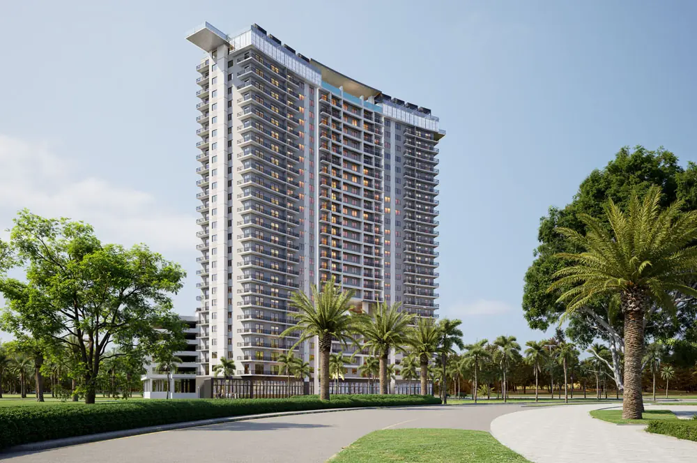 Three-quarter view of Marbella Tower showing the curved balcony stack and crown
